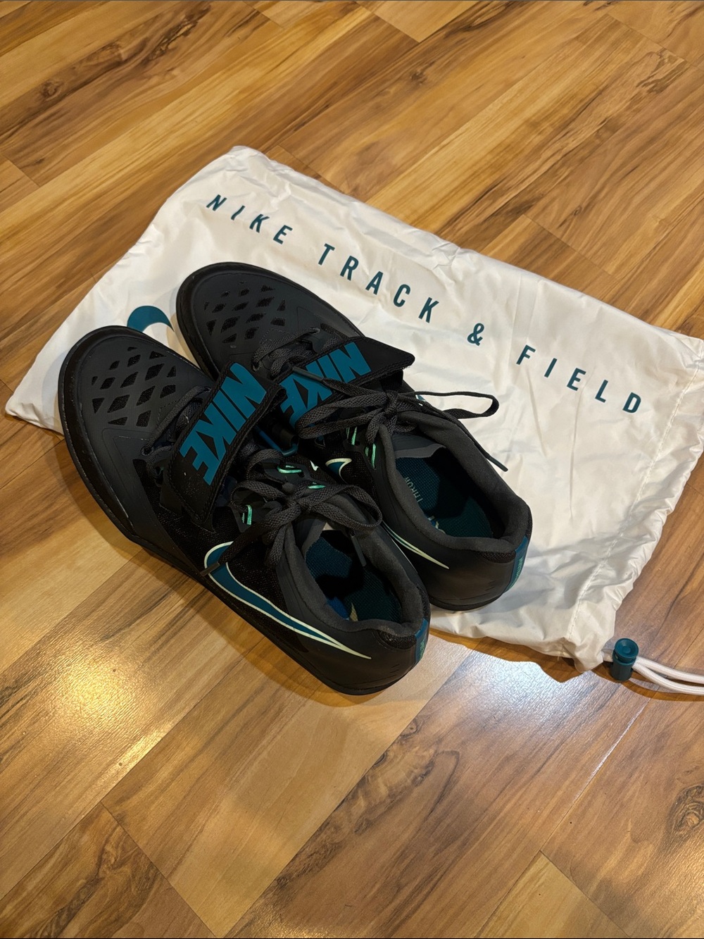 Nike Men’s Black Athletic Track & Field Shoes Throwers Shoe with Teal Accents